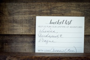 card that reads "bucket list: help us plan our lifetime of adventures"